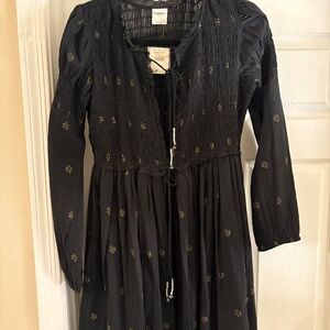 Free People size small in black w/gold embroidered flowers